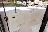 2017 Leopard 51 Powercat boat interior with seating area and waterfront view.