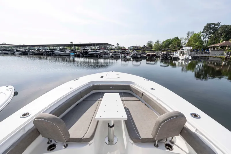  Yacht Photos Pics 2026 Sea Hunt Gamefish 28 Forward Seating boat at a marina, calm water, clear sky.