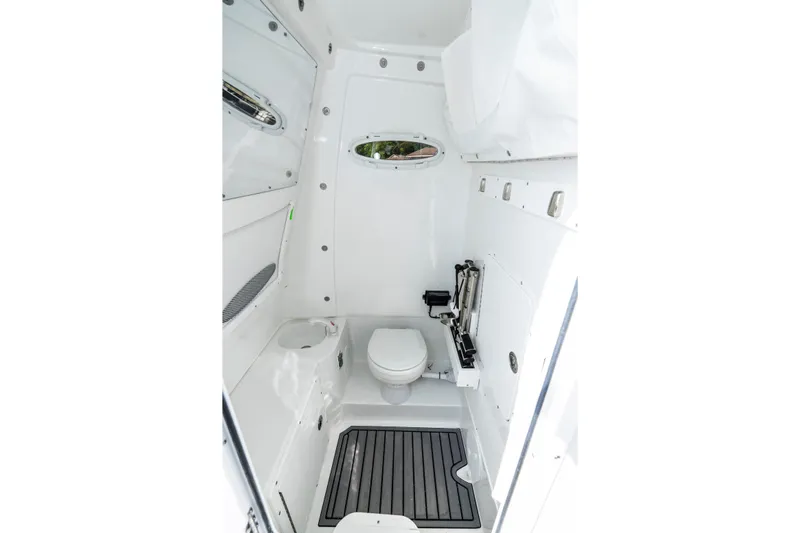  Yacht Photos Pics Interior of 2026 Sea Hunt Gamefish 28 boat bathroom with modern amenities.