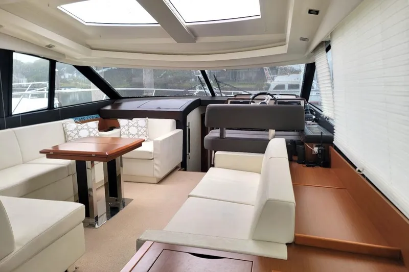  Yacht Photos Pics Luxurious interior of 2013 Prestige 500 S yacht with elegant seating and modern design.