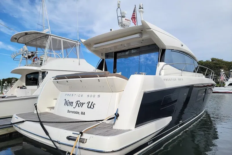  Yacht Photos Pics 2013 Prestige 500 S yacht docked, rear view, named "Won For Us," Barnstable, MA.