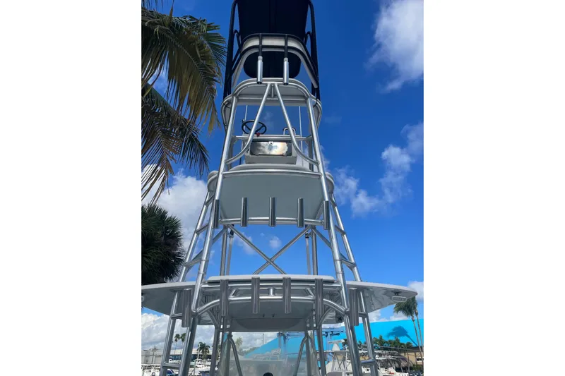  Yacht Photos Pics 2016 Contender 39 ST boat tower against a clear blue sky.