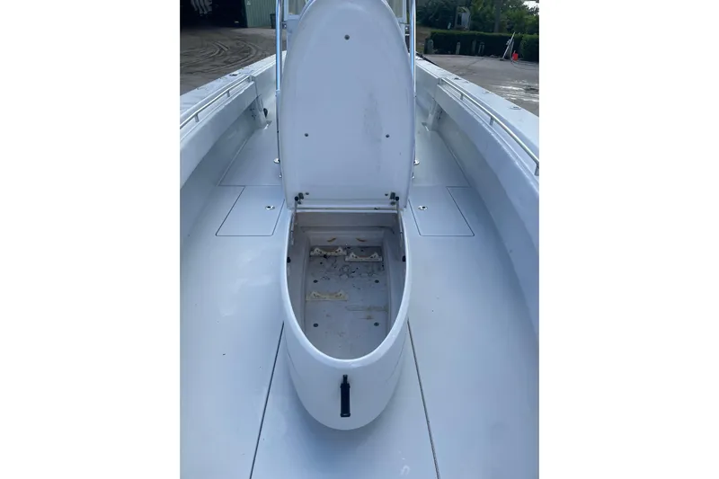  Yacht Photos Pics 2016 Contender 39 ST boat with open storage compartment on deck.