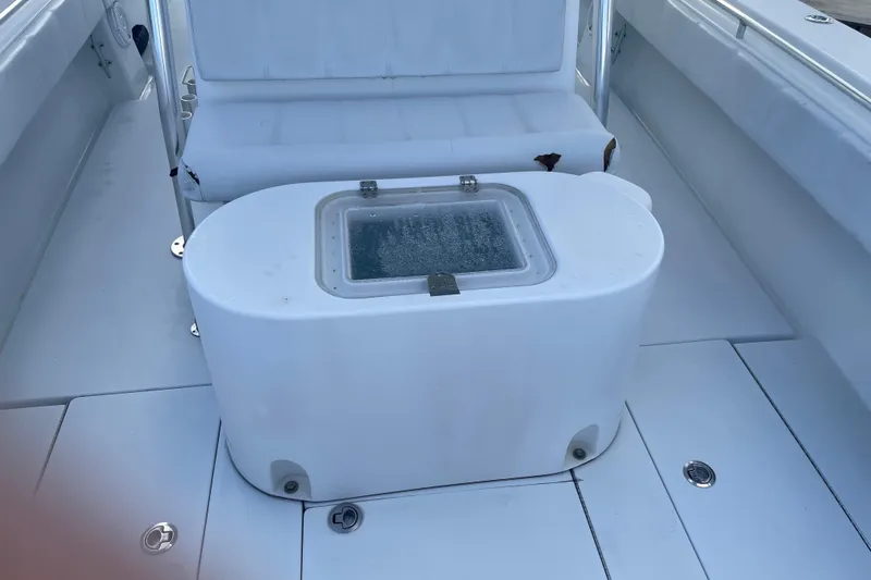  Yacht Photos Pics 2016 Contender 39 ST boat interior with seating and storage compartment.