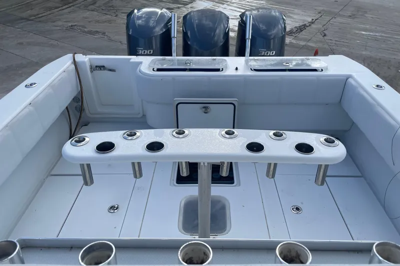  Yacht Photos Pics 2016 Contender 39 ST boat deck with rod holders and triple Yamaha 300 engines.