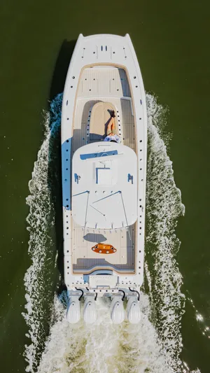  Yacht Photos Pics Aerial view of 2025 Freeman 38 boat cruising on water.
