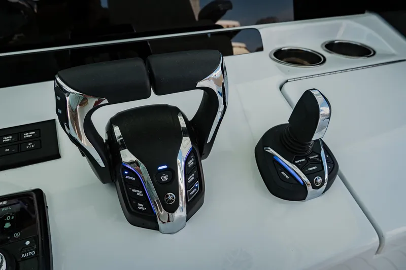  Yacht Photos Pics Control panel of Freeman 38 boat, featuring advanced throttle and joystick, 2025 model.