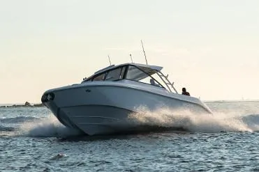  Yacht Photos Pics Manufacturer Provided Image: 2019 Everglades 340 Dual Console boat cruising on open water.