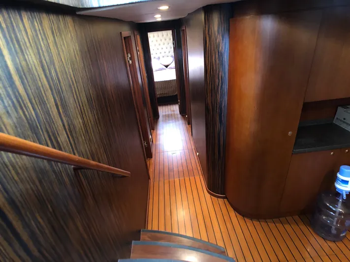 Atl 953 Yacht Photos Pics Luxurious wooden interior of a 1991 Custom 23m Epoxy Hull yacht hallway.