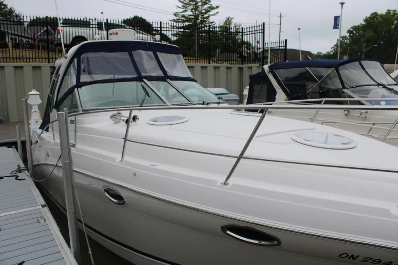  Yacht Photos Pics 2011 Four Winns V335 boat docked, featuring sleek design and modern amenities.