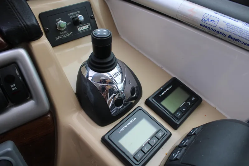  Yacht Photos Pics Control panel of 2011 Four Winns V335 boat with joystick and digital displays.