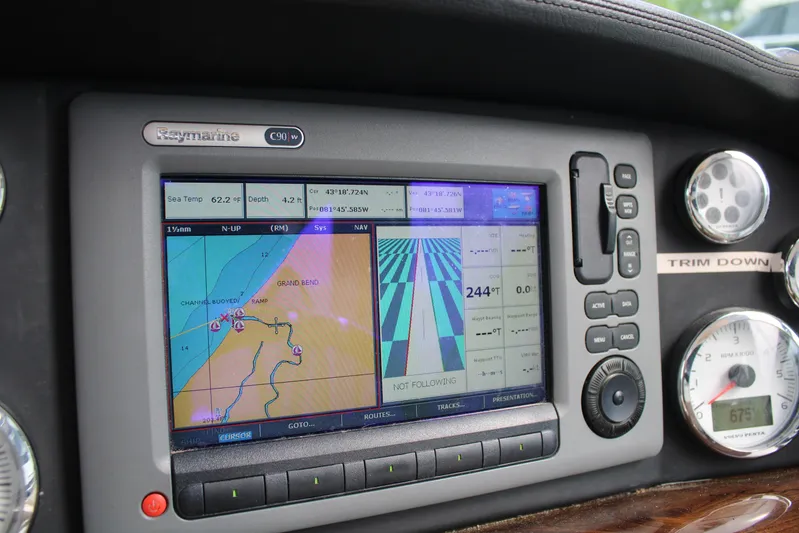  Yacht Photos Pics Raymarine navigation system on 2011 Four Winns V335 boat dashboard.