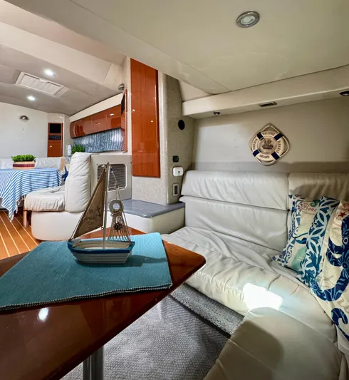  Yacht Photos Pics Luxurious 2006 Formula 40pc yacht interior with elegant seating and nautical decor.