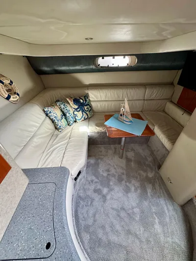  Yacht Photos Pics 2006 Formula 40pc yacht interior with plush seating and decorative pillows.