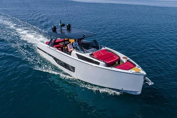  Yacht Photos Pics 2025 Cranchi A46 Luxury Tender cruising on open water, featuring sleek design and red seating.