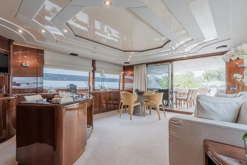 Let It Be Yacht Photos Pics Luxurious 1998 Tecnomarine Custom yacht interior with elegant wood finishes and modern furnishings.