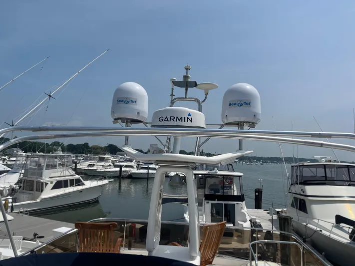 C Glass Yacht Photos Pics Princess 65 M/Y 2000 yacht with Garmin and Sea Tel equipment at marina.