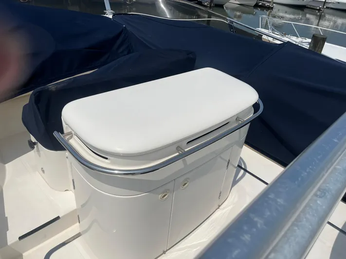 C Glass Yacht Photos Pics Luxury yacht deck with white seating, Princess 65 M/Y, 2000 model, docked at marina.