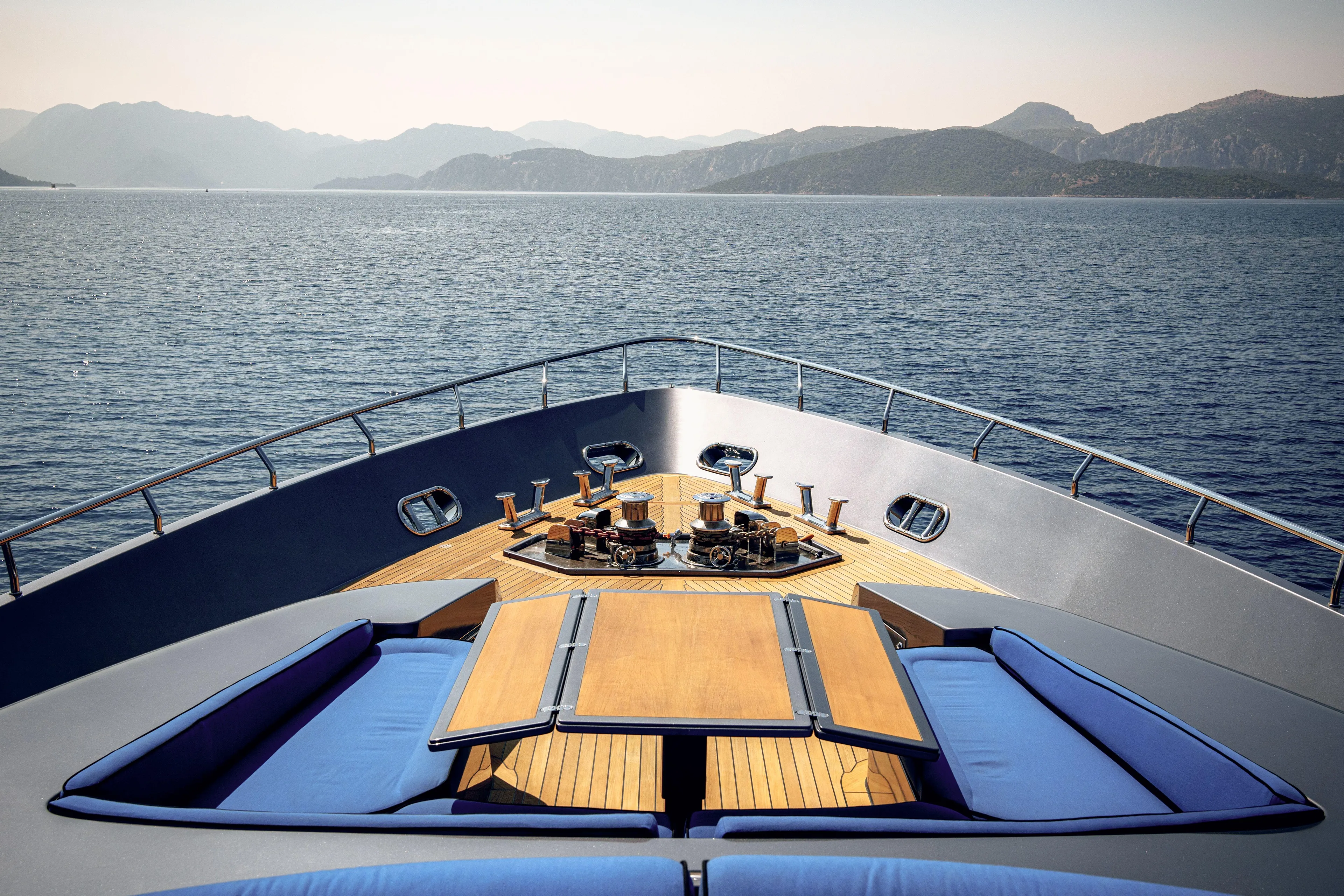 Ginger Yacht Photos Pics Luxurious 2006 Pershing 115 yacht deck with stunning ocean and mountain views.