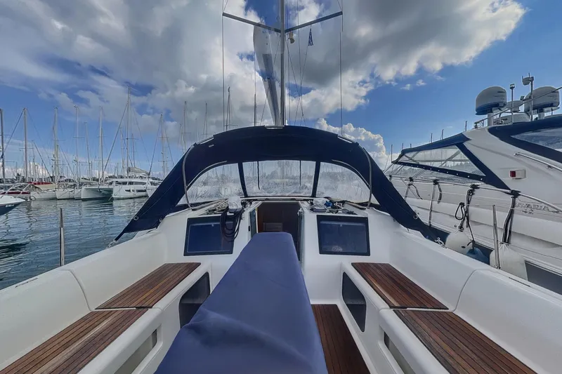  Yacht Photos Pics Sailing yacht Dufour 41.2 GL, 2015 model, docked at marina under cloudy sky.