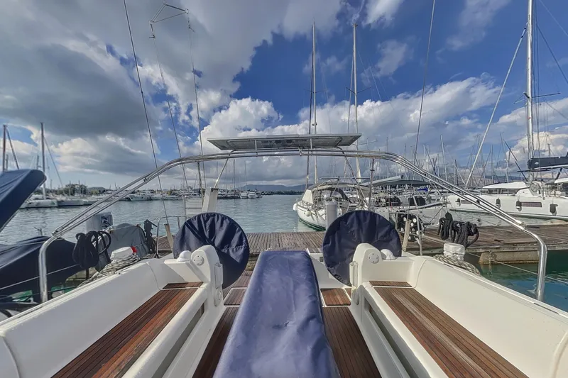  Yacht Photos Pics Dufour 41.2 GL sailboat docked at marina, 2015 model, under partly cloudy sky.