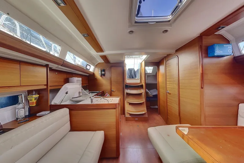  Yacht Photos Pics Interior of 2015 Dufour 41.2 GL yacht with wooden finish and modern amenities.