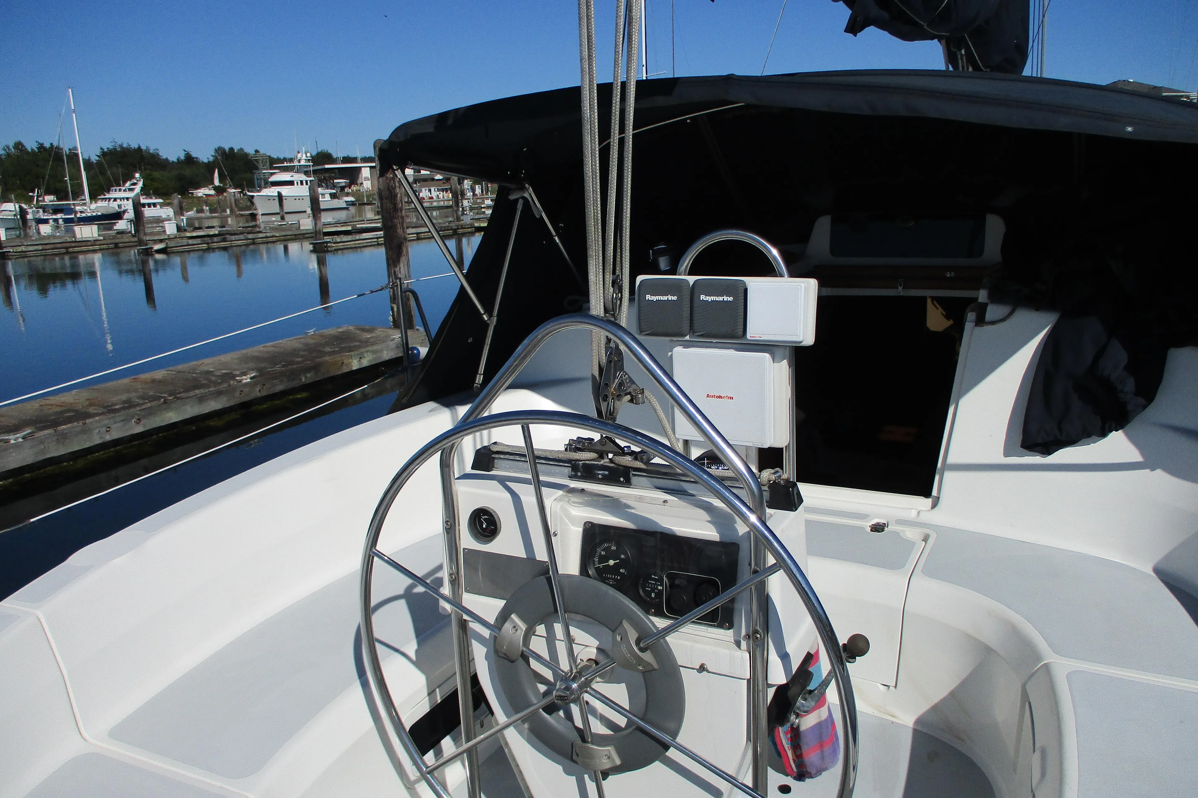 Cockpit of a 1995 Hunter 336 sailboat in harbor.