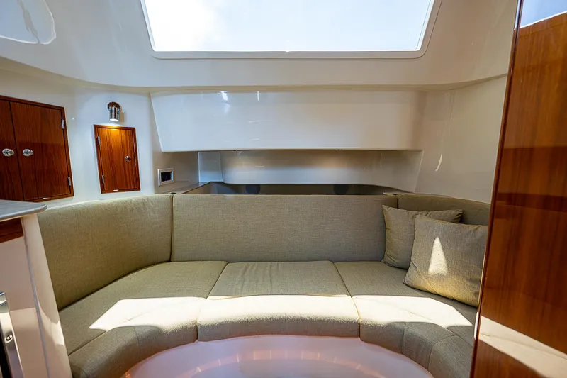 Tropical Breeze Yacht Photos Pics Hinckley Sport Boat 40 C 2020 interior with elegant seating and natural light.