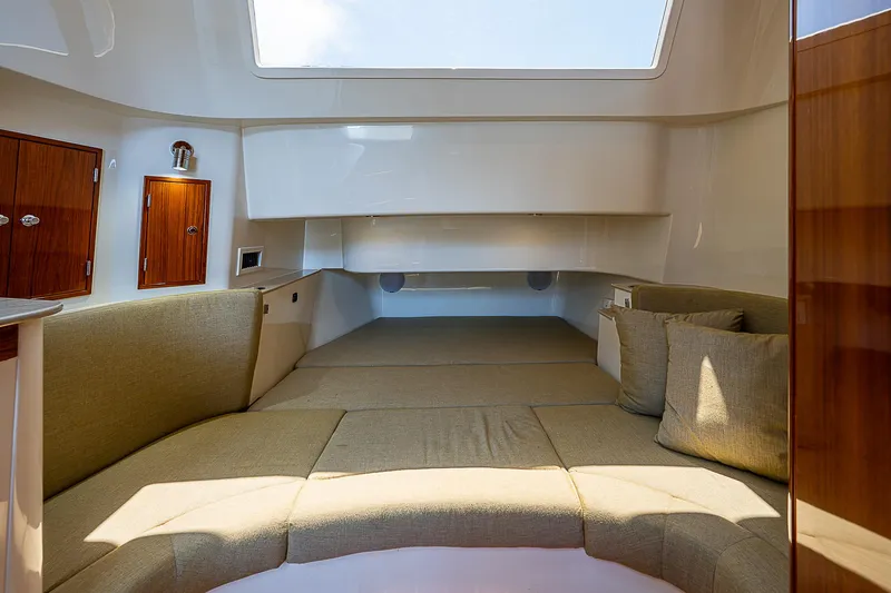 Tropical Breeze Yacht Photos Pics Interior of 2020 Hinckley Sport Boat 40 C, featuring spacious seating and modern design.