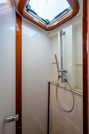 Tropical Breeze Yacht Photos Pics Hinckley Sport Boat 40 C 2020 shower with skylight and sleek design.