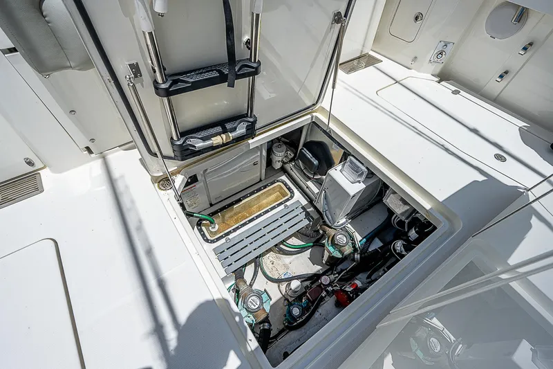 Tropical Breeze Yacht Photos Pics 2020 Hinckley Sport Boat 40 C engine compartment with visible mechanical components.