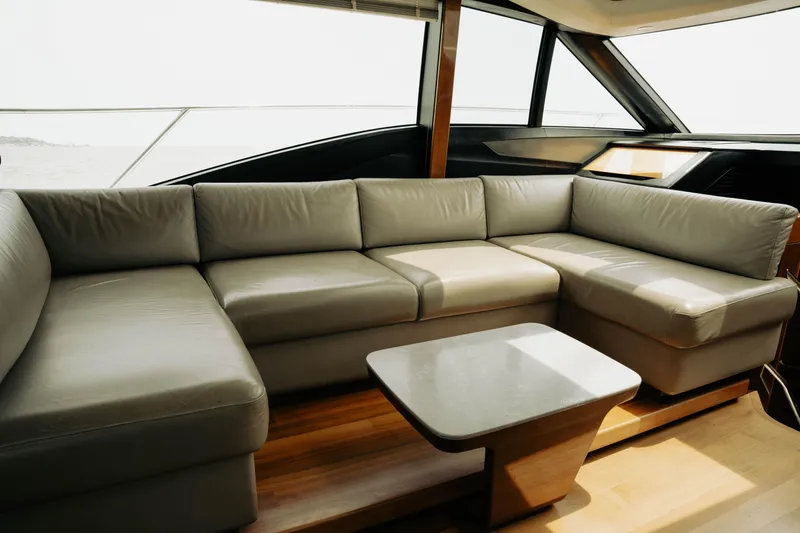 Amaray Yacht Photos Pics Luxurious interior of 2020 Princess S62 yacht with elegant leather seating and modern design.