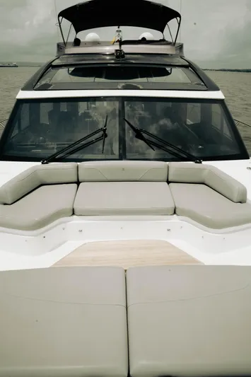 Amaray Yacht Photos Pics 2020 Princess S62 yacht with spacious deck seating and sleek design on calm waters.