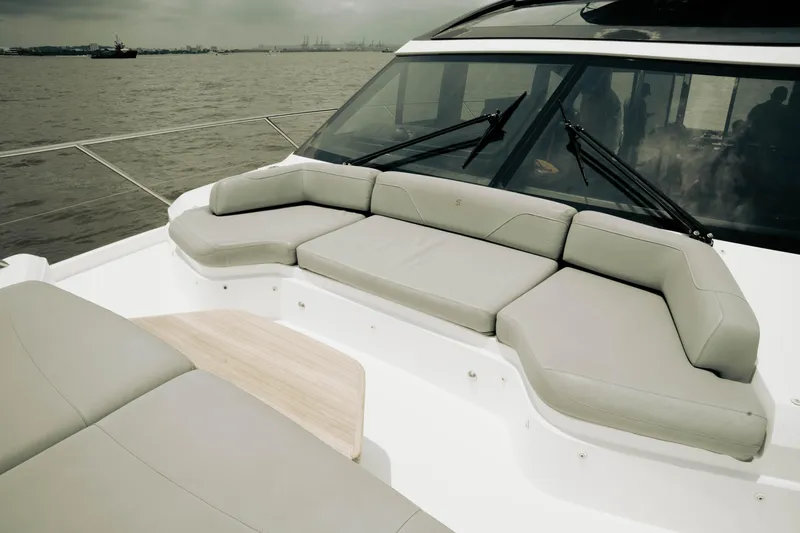 Amaray Yacht Photos Pics Luxurious seating area on 2020 Princess S62 yacht, overlooking calm waters.