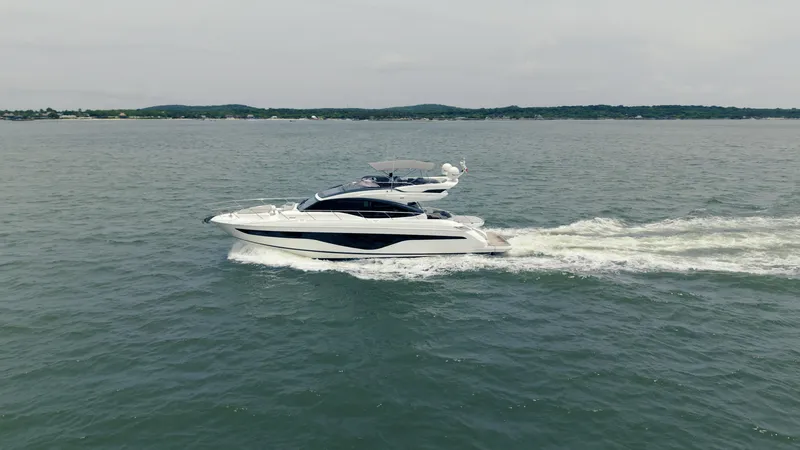 Amaray Yacht Photos Pics Luxury Princess S62 yacht cruising on open water, 2020 model.