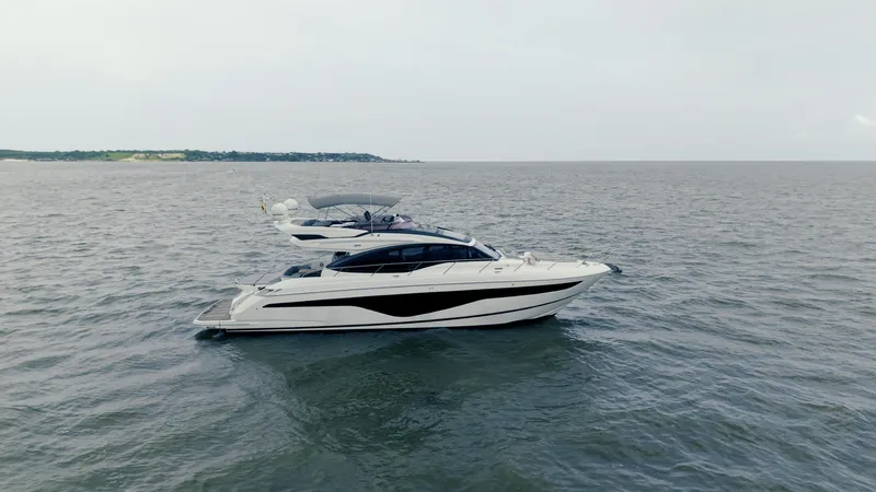 Amaray Yacht Photos Pics Luxurious 2020 Princess S62 yacht cruising on open water.