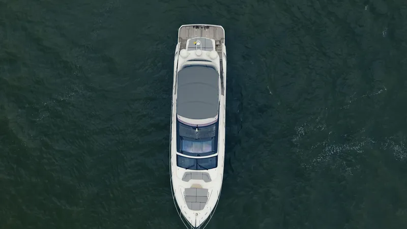 Amaray Yacht Photos Pics Aerial view of 2020 Princess S62 yacht cruising on open water.