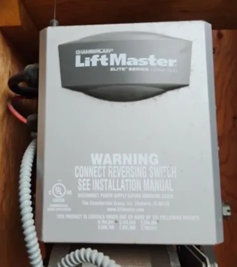  Yacht Photos Pics LiftMaster Elite Series garage door opener with warning label, Custom Boathouse model, 2012.