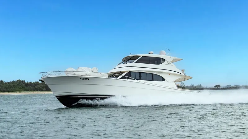 Unchained Freedom Yacht Photos Pics 2007 Maritimo M60 Cruising Motor Yacht navigating on open water.