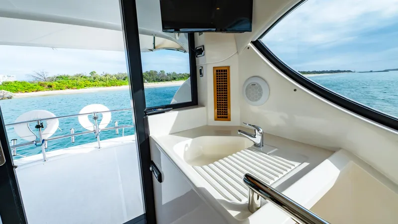 Unchained Freedom Yacht Photos Pics 2007 Maritimo M60 Cruising Motor Yacht interior with ocean view and modern amenities.