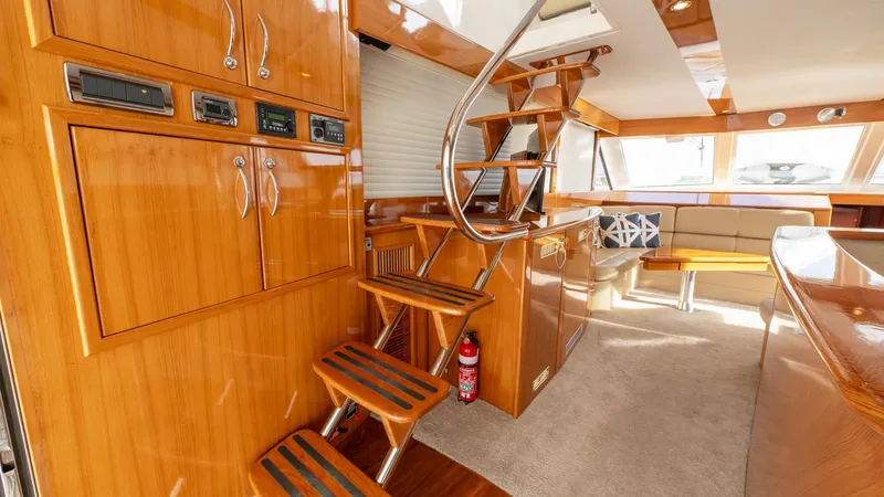 Unchained Freedom Yacht Photos Pics Interior of 2007 Maritimo M60 yacht with wooden finishes and modern design.