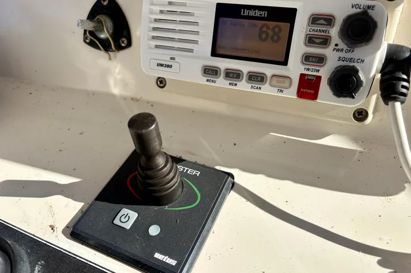 Kronberg Yacht Photos Pics Control panel of a 1990 Neptunus 145 AC yacht with Uniden radio and joystick.