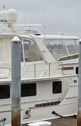 Bee Haven Yacht Photos Pics 2006 Fleming 65 Pilothouse Motor Yacht docked at marina.