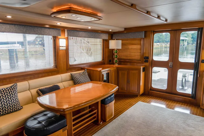 Bee Haven Yacht Photos Pics Luxurious interior of 2006 Fleming 65 Pilothouse Motor Yacht with elegant wood finishes.