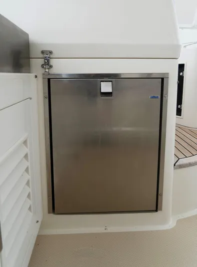 Bee Haven Yacht Photos Pics Stainless steel door on 2006 Fleming 65 Pilothouse Motor Yacht interior.