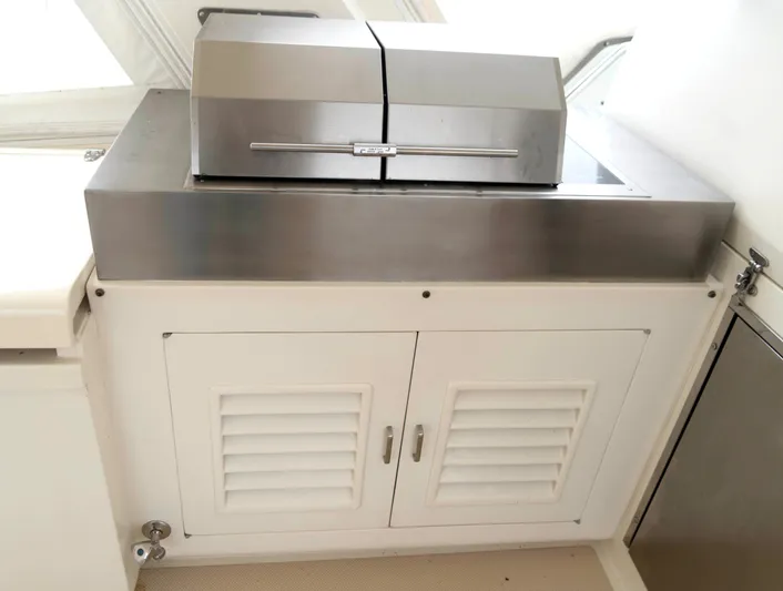 Bee Haven Yacht Photos Pics Stainless steel grill on 2006 Fleming 65 Pilothouse Motor Yacht.