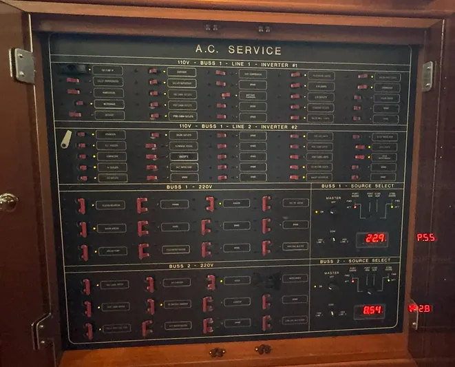 Bee Haven Yacht Photos Pics Electrical panel on a 2006 Fleming 65 Pilothouse Motor Yacht, showing AC service controls.