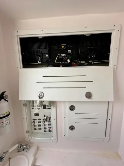  Yacht Photos Pics Electrical panel and equipment in a 2021 Streamline 35CC boat interior.