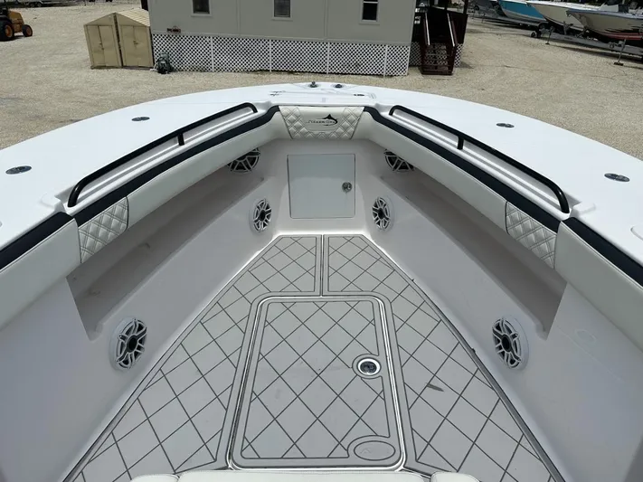  Yacht Photos Pics 2021 Streamline 35CC boat interior with diamond-patterned flooring and cushioned seating.