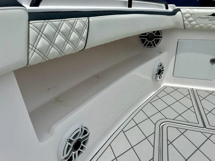  Yacht Photos Pics Interior of 2021 Streamline 35CC boat with quilted upholstery and speaker system.